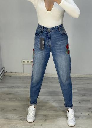 Джинси з вишивкою
