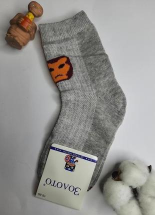 Шкарпетки дитячі в сіточку зі значками супергероїв різні в каруселі