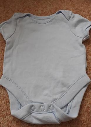Фирменный бодик на новорожденного