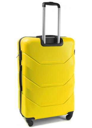 Желтый дорожный пластиковый чемодан на колесах wings 147 размер s ручная кладь2 фото