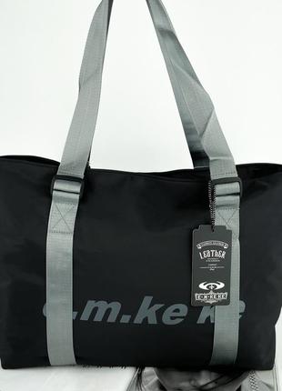 Женская текстильная спортивная дорожная двухсторонняя сумка на плечо черная