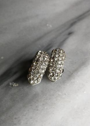Ошатні кліпси металеві з білими стразами камінням