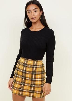 Юбкс в клетку
