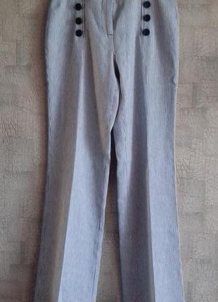 Оригинальные расклешенные женские брюки zara в мелкую полоску.