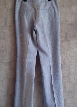 Оригинальные расклешенные женские брюки zara в мелкую полоску.2 фото