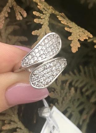 Новое серебряное кольцо с фианитами, серебро 925 проба.2 фото