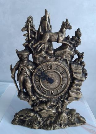 Камінний годинник