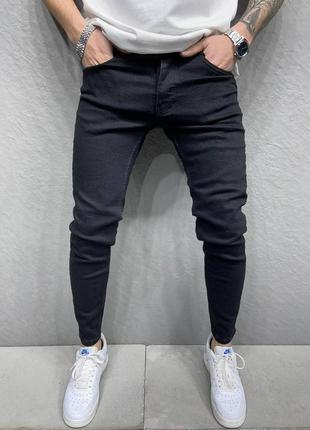 Стильні чорні чоловічі джинси