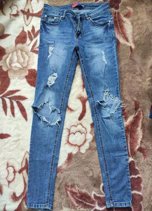 Джинсы рваные,джинсы женские,джинсы летние1 фото