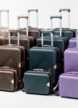 Крепкий дорожный бордовый чемодан на колесиках wings чемодан wn-01 s (ручная кладь) материал поликарбонат7 фото