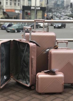 Жіноча золота дорожня валіза маленька на 4 коліщатках wings wn-01 rose gold  s (ручна поклажа) полікарбонат8 фото