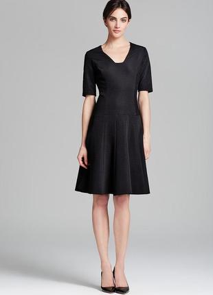 Черное платье средней длины а-силуэт из фактурной ткани на 46-48 р