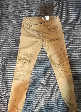 Женские бежевые джинсы c вставками под кожу