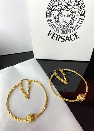 Круглые серьги в позолоте