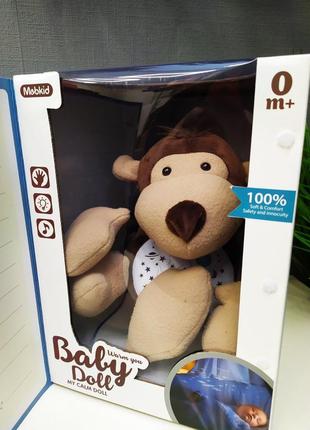 Ночник baby doll обезьянка ( с проектором, 7 мелодий, свет, звук). подарочная коробка.2 фото