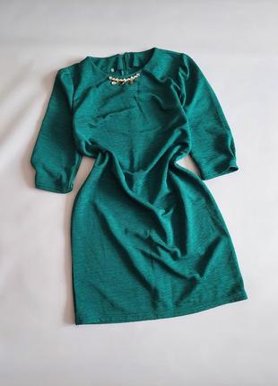 Сукня смарагдового кольору