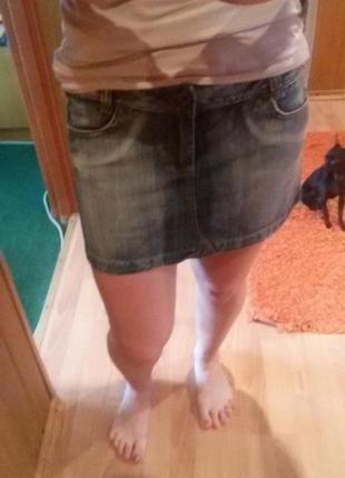 Джинсова спідничка з кишеньками