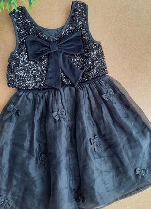 Нарядное черное платье в пайетках с пышной юбкой 9 лет2 фото