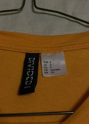 Оранжевый лонгслив h&m с принтом fajling6 фото