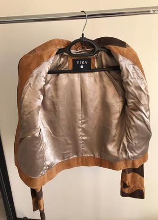 Женская новая кожаная куртка.4 фото