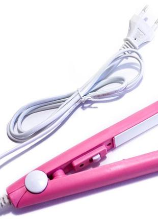 Парикмахерский мини-утюжок выпрямитель для волос розовый1 фото