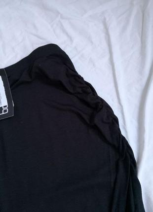 Роскошная черная ассиметричная юбка с глубоким разрезом.5 фото
