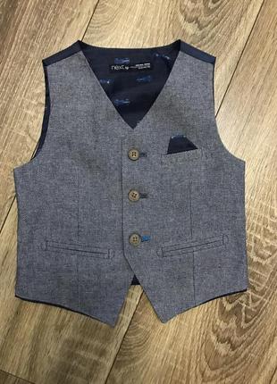 Жилетка next