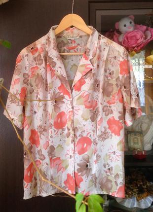 Яркая летняя блуза в цветочный принт1 фото