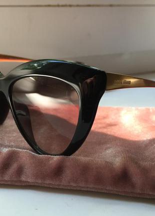 Сонцезахисні окуляри miu miu3 фото