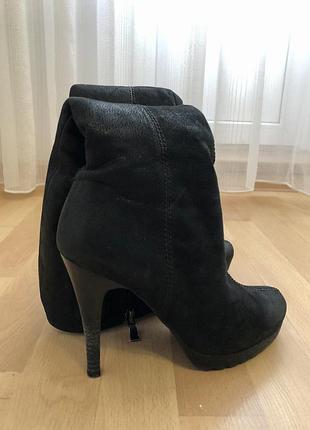 Зимние сапоги на каблуке