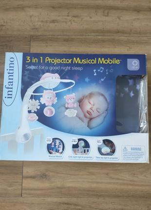 Infantino мобиль музыкальный с проектором 3 в 1, розовый1 фото