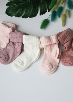 Рожеві шкарпеточки для малюків1 фото