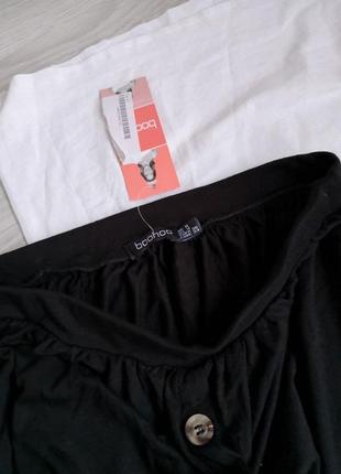 Насыщенная черная плотная трикотажная юбочка макси с пуговицами5 фото