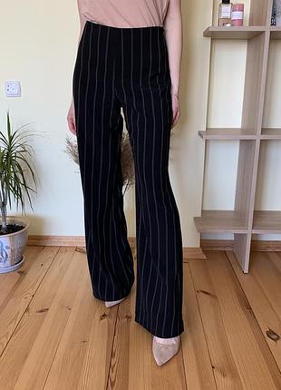 Класичні штани з високою посадкою в смужку