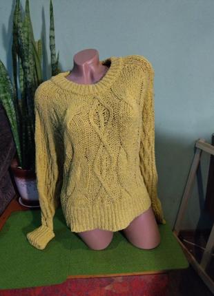 Уютный свитер вязка косами желто горчичного цвета1 фото