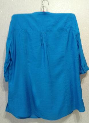 Симпатична туніка великого розміру.