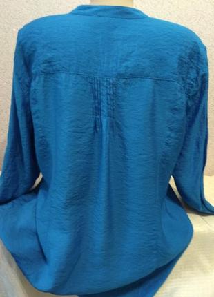 Симпатична туніка великого розміру.