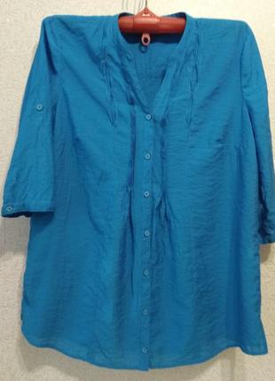 Симпатична туніка великого розміру.