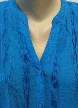 Симпатична туніка великого розміру.