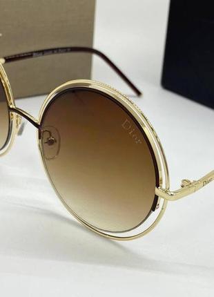 Стильні сонцезахисні окуляри d*or коричневі кругляшки6 фото