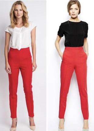 Яркие красные стильные брюки с разрезами1 фото