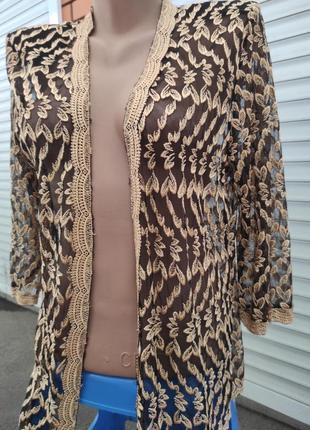 Жіноча накидка, кофточка