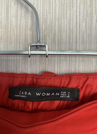 Яскраві червоні стильні штани з розрізами3 фото