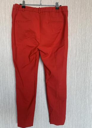 Яркие красные стильные брюки с разрезами4 фото