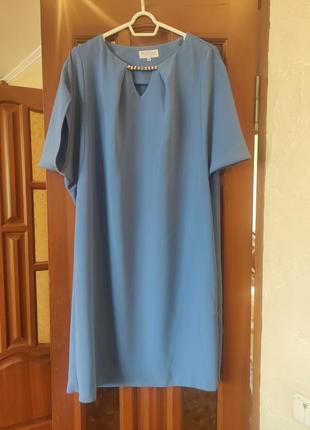 Ошатне плаття світло-синього кольору