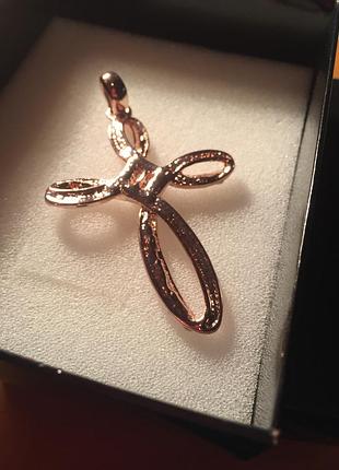 Крестик от тюсо