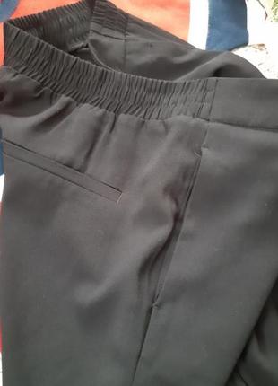 Стильные черные широкие брюки hm размер 16 батал внизу пуговицы и разрезики5 фото