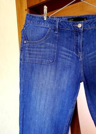 Зауженные укороченные джинсы с отворотиками next 18 состоянии новых.7 фото