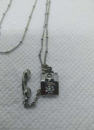 Длинная цепочка с оригинальной подвеской дисковый телефон с кристаллами и снимающейся трубкой на магните1 фото