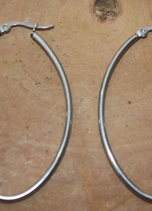 Стильні лаконічні овальні сережки сталь2 фото